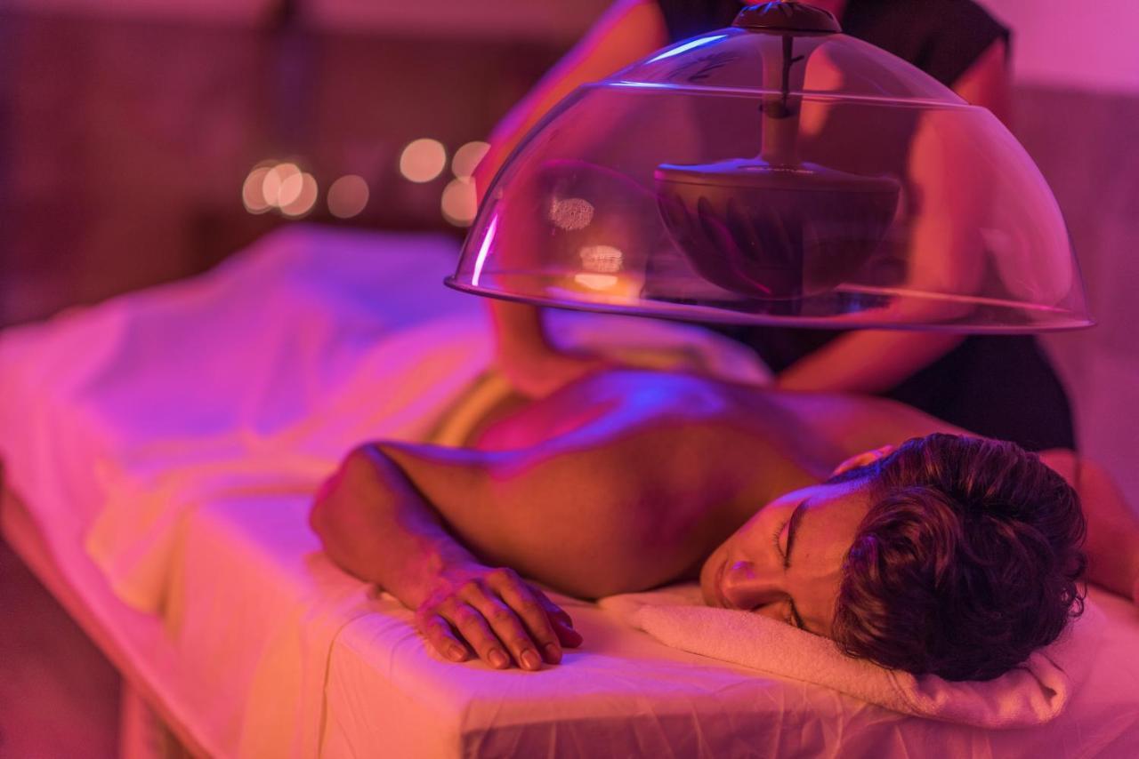 Hard Rock Hotel Goa Calangute Exterior photo A patient receiving a cupping treatment